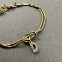 Till min Dotter - Love knot armband - Guld